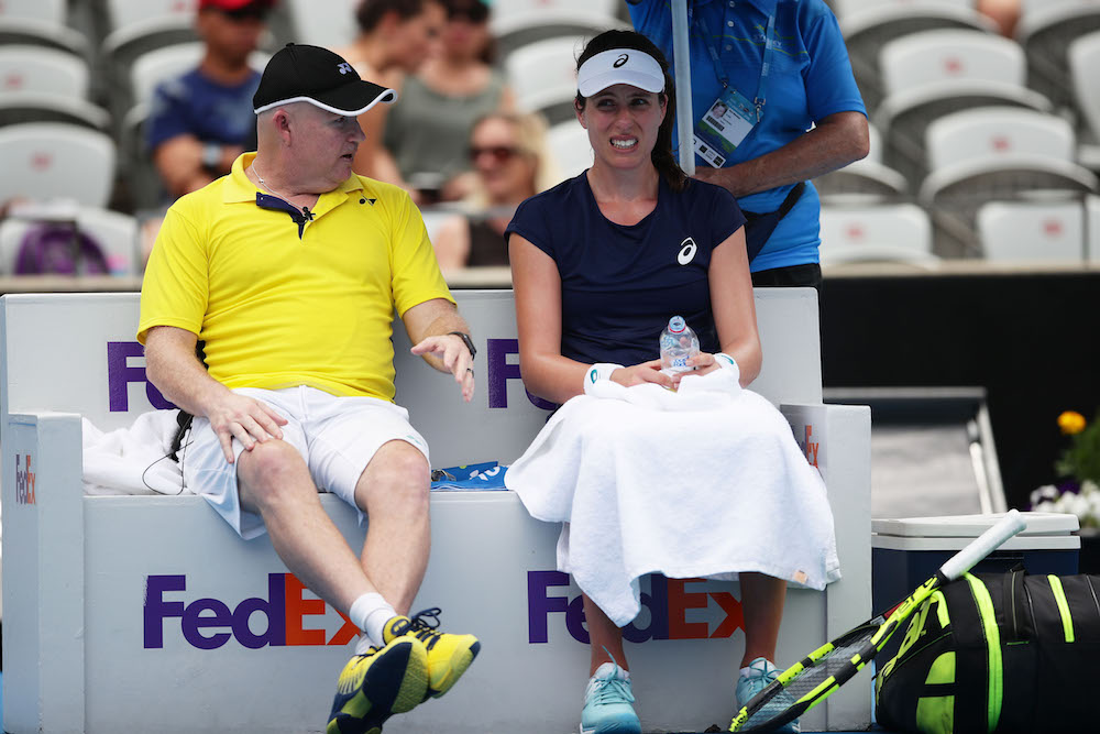 Johanna Konta speaking with Michael Joyce in the first round of the Sydney International, 2018
