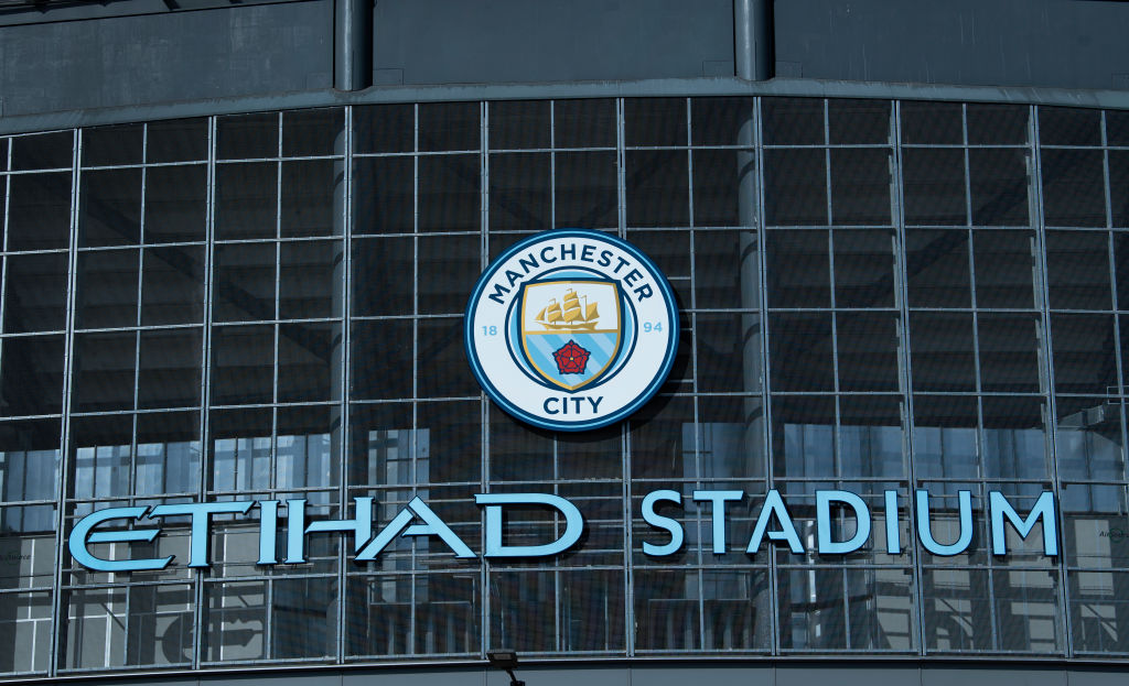 Manchester City Logo and Statdium